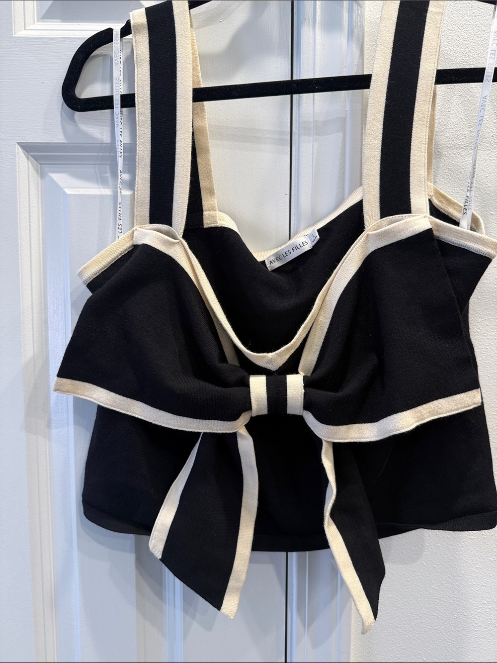 Avec Les Filles Black Top with Cream Trim and Front Bow Accent